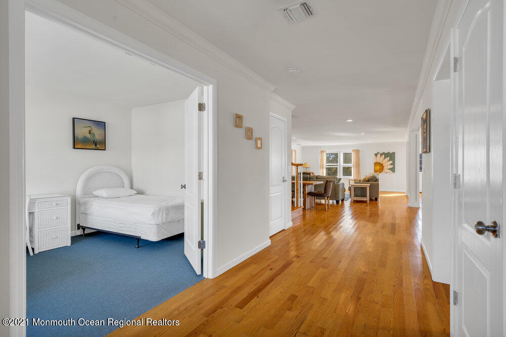 32 Niblick Street Point Pleasant Beach, NJ 08742 - Photo 6 of 38 a living room with furniture and a wooden floor