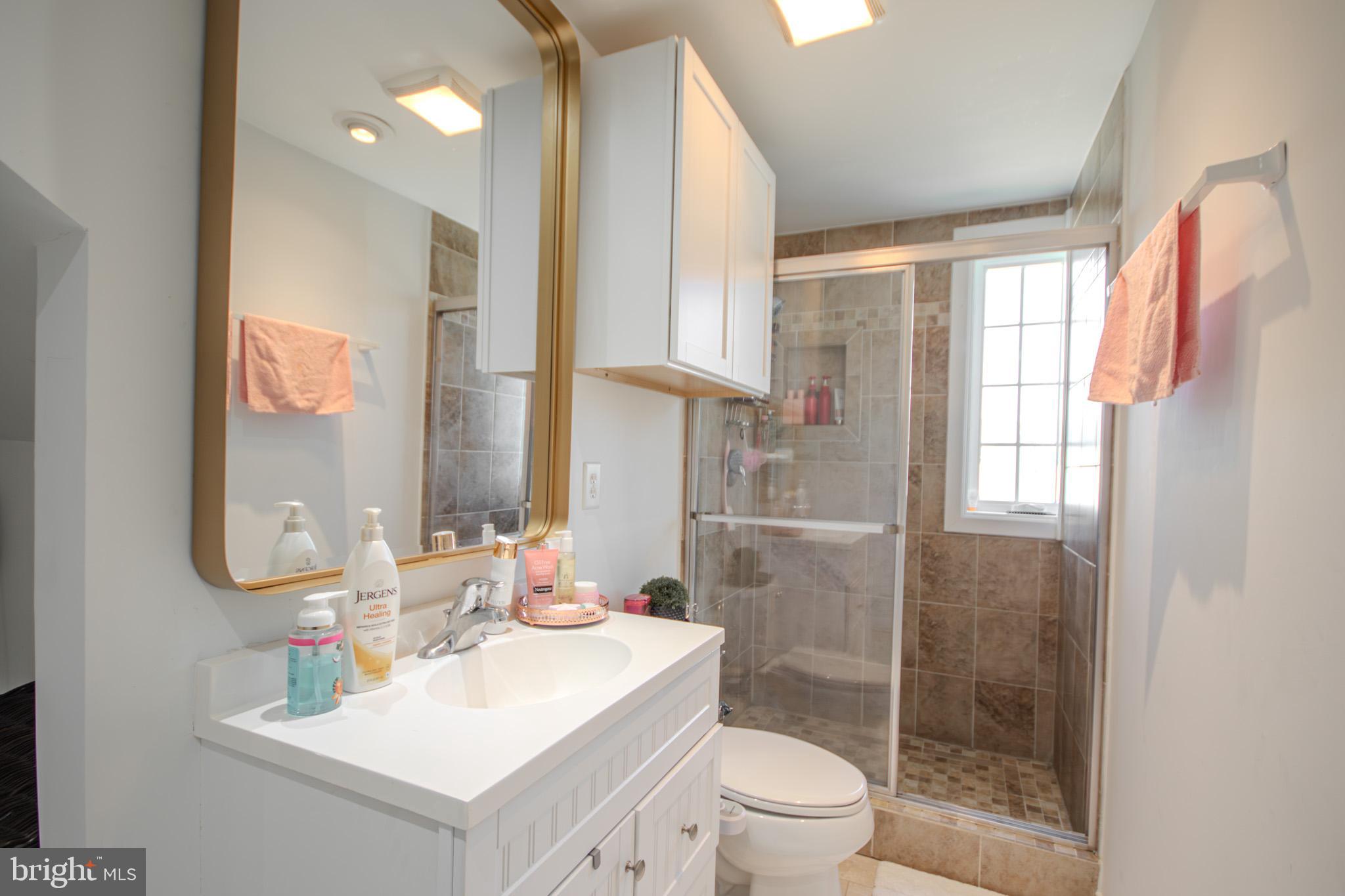 1519 Anchors Way Salisbury, MD 21801 - Photo 18 of 49 a bathroom with a sink toilet and shower