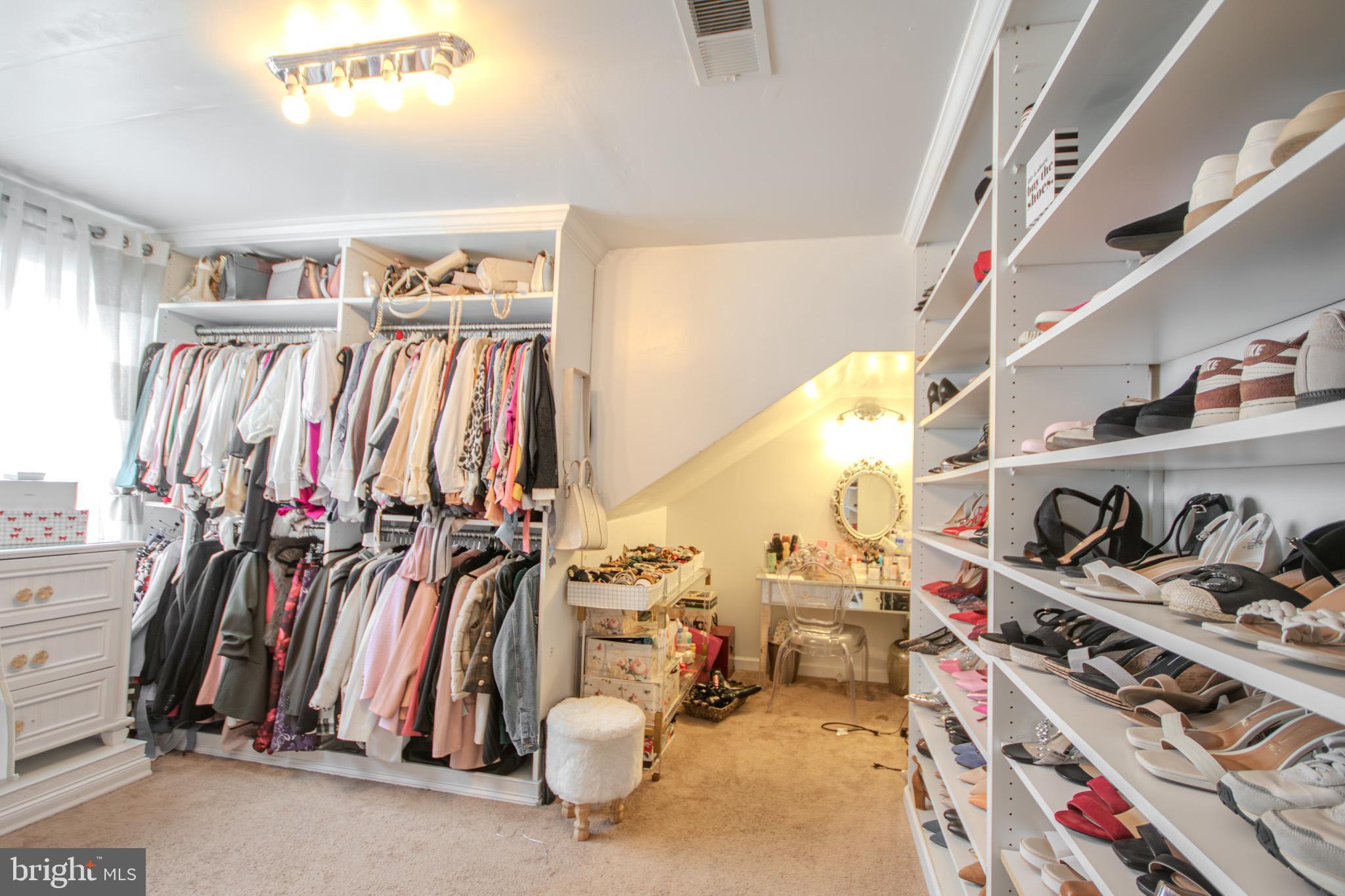 1519 Anchors Way Salisbury, MD 21801 - Photo 19 of 49 a view of walk in closet with clothes and shoes