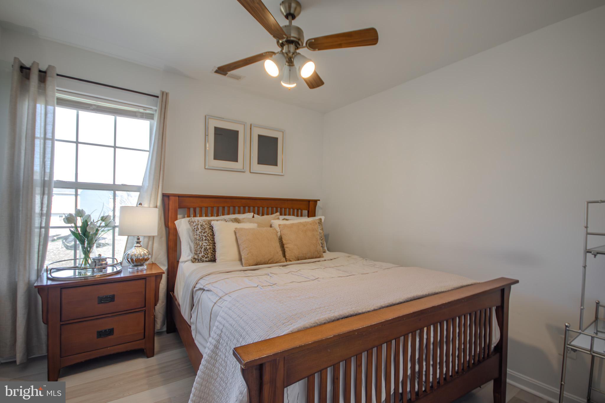 1519 Anchors Way Salisbury, MD 21801 - Photo 24 of 49 a bedroom with a bed and a window