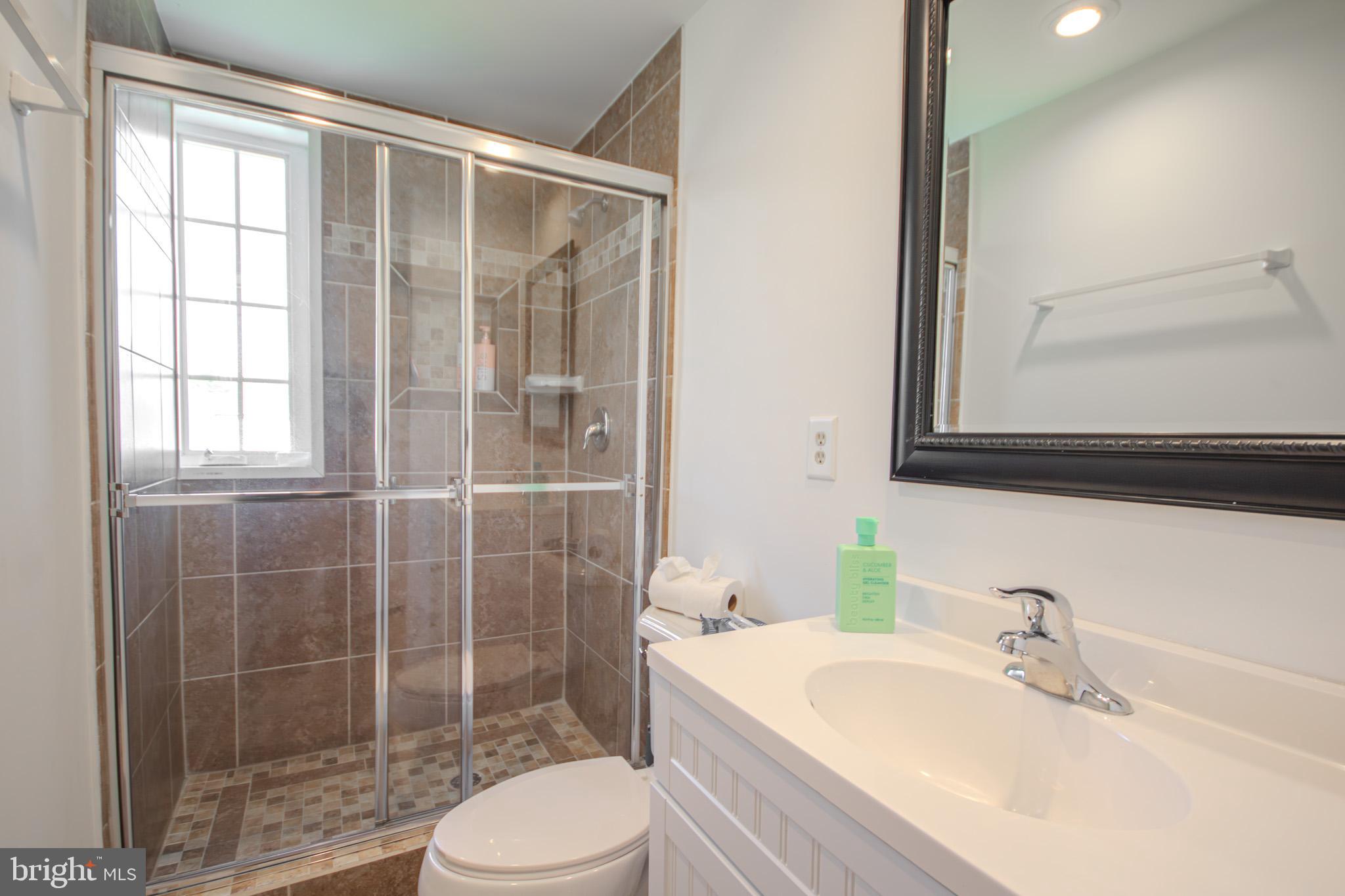 1519 Anchors Way Salisbury, MD 21801 - Photo 26 of 49 a bathroom with a sink toilet and shower