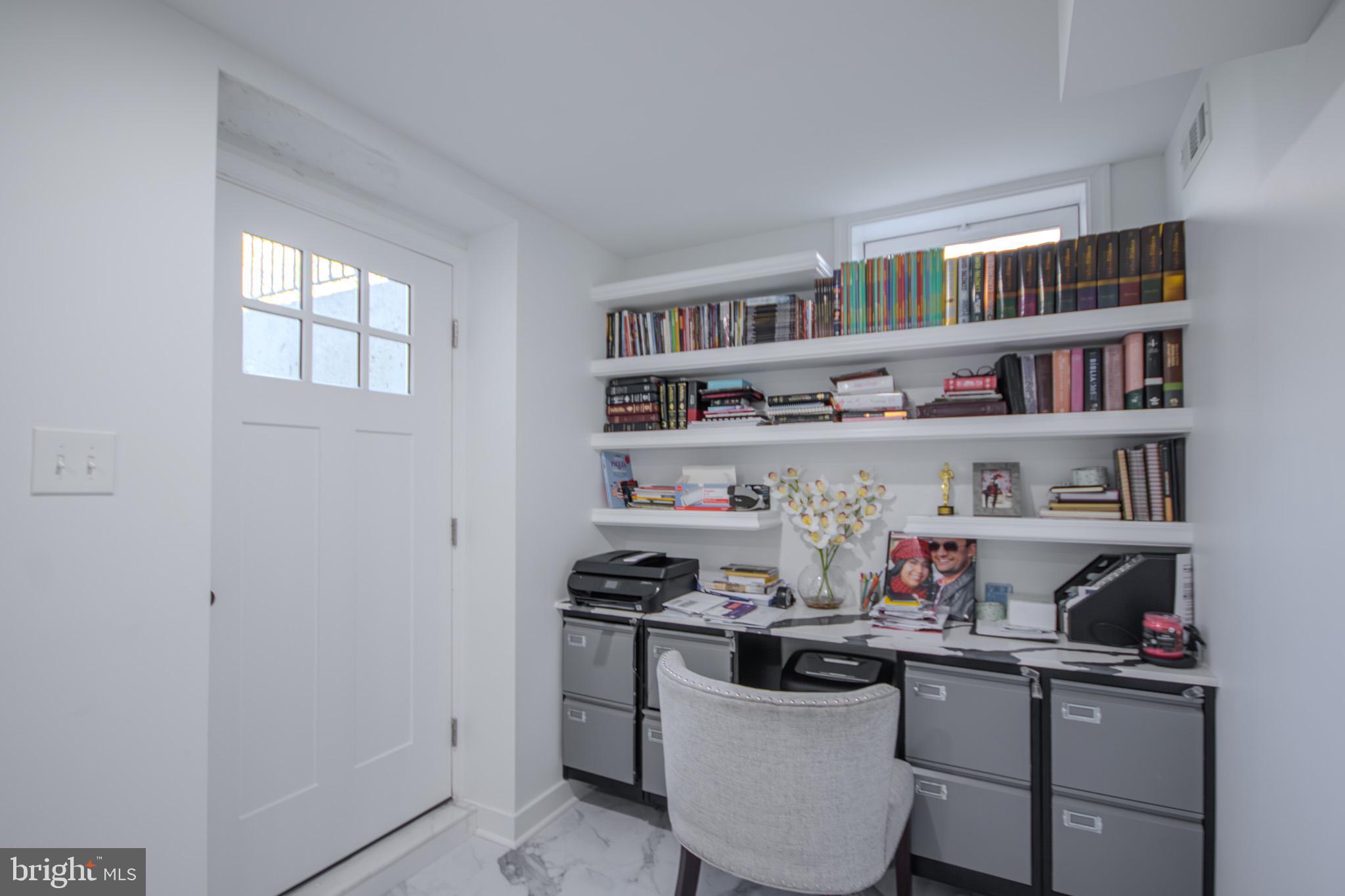 1519 Anchors Way Salisbury, MD 21801 - Photo 35 of 49 a room with a book shelf and a window