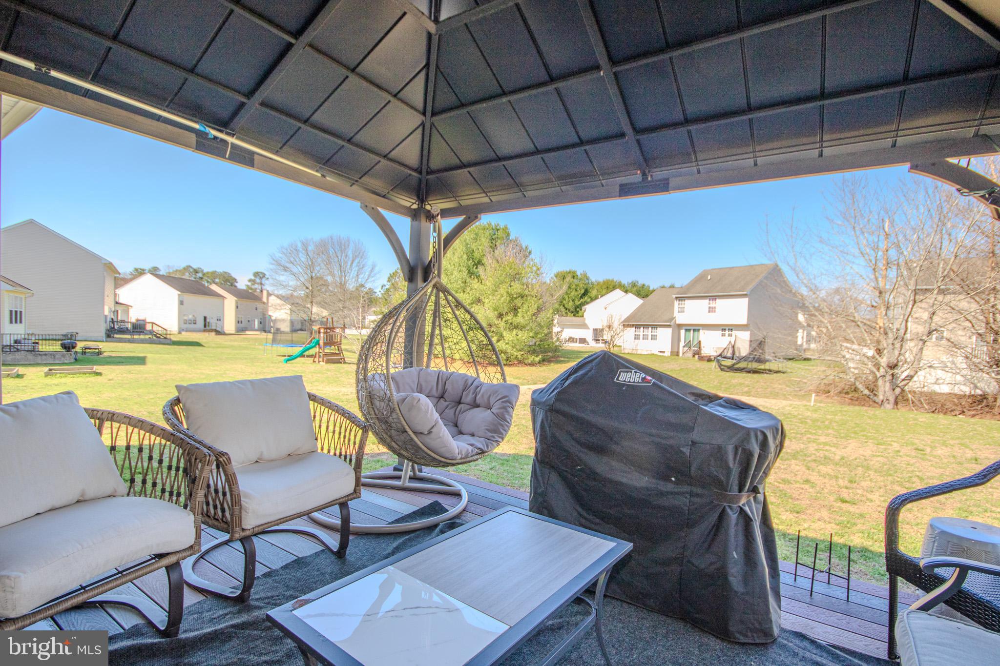 1519 Anchors Way Salisbury, MD 21801 - Photo 39 of 49 a view of a chairs and table in patio with a barbeque