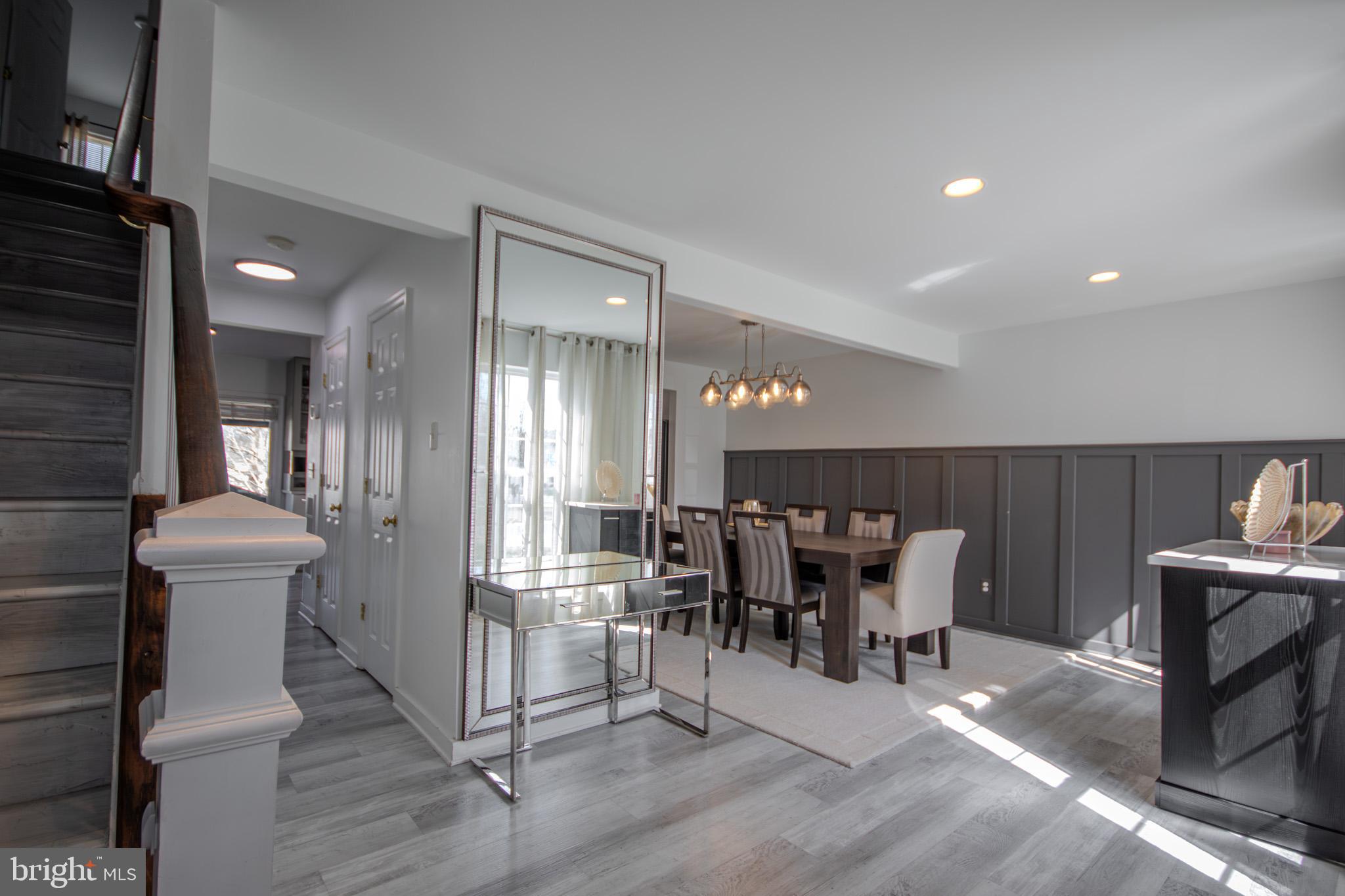 1519 Anchors Way Salisbury, MD 21801 - Photo 5 of 49 a view of a dining room with furniture and chandelier