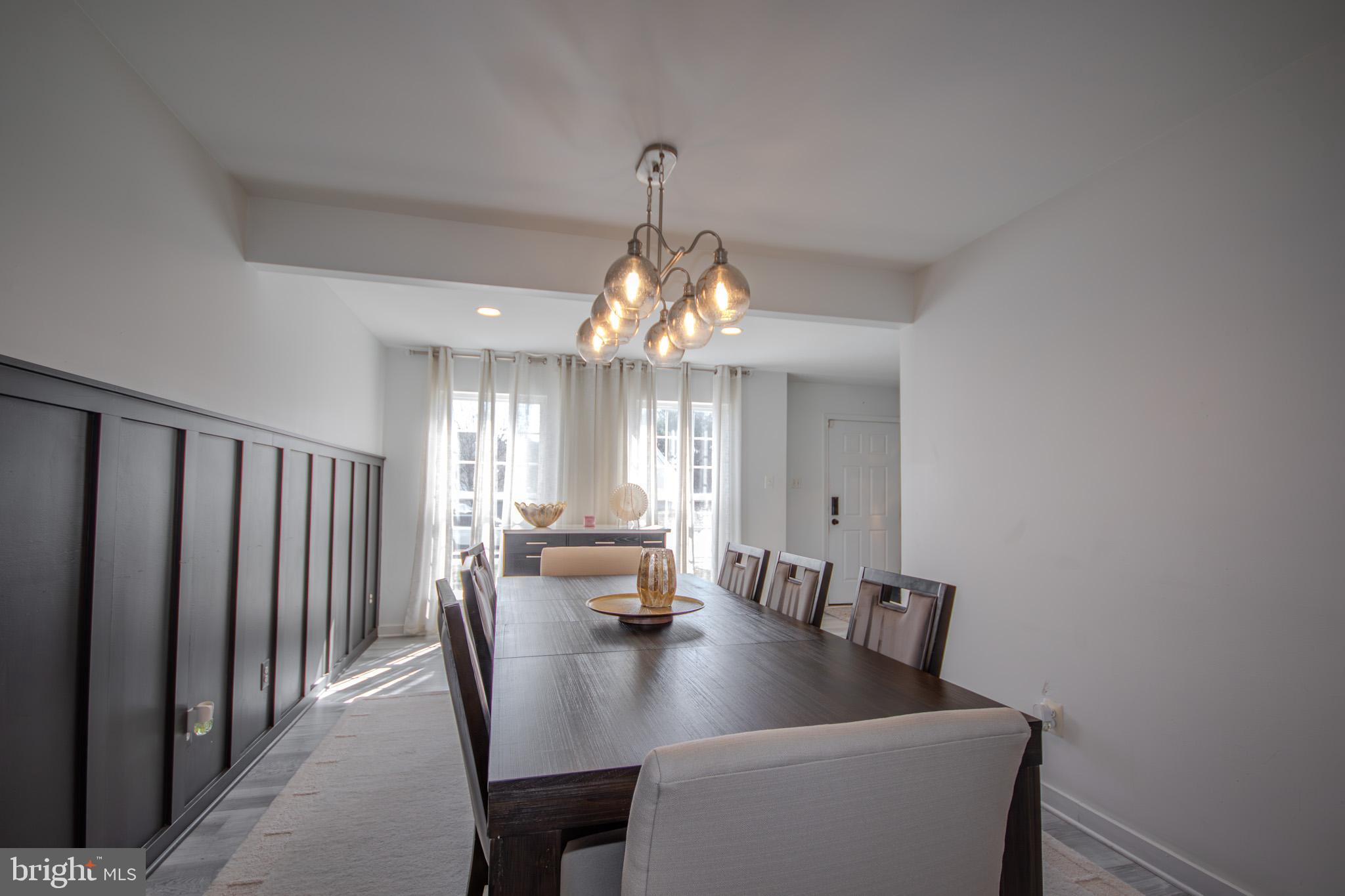 1519 Anchors Way Salisbury, MD 21801 - Photo 7 of 49 a view of a a dining room with furniture window and wooden floor