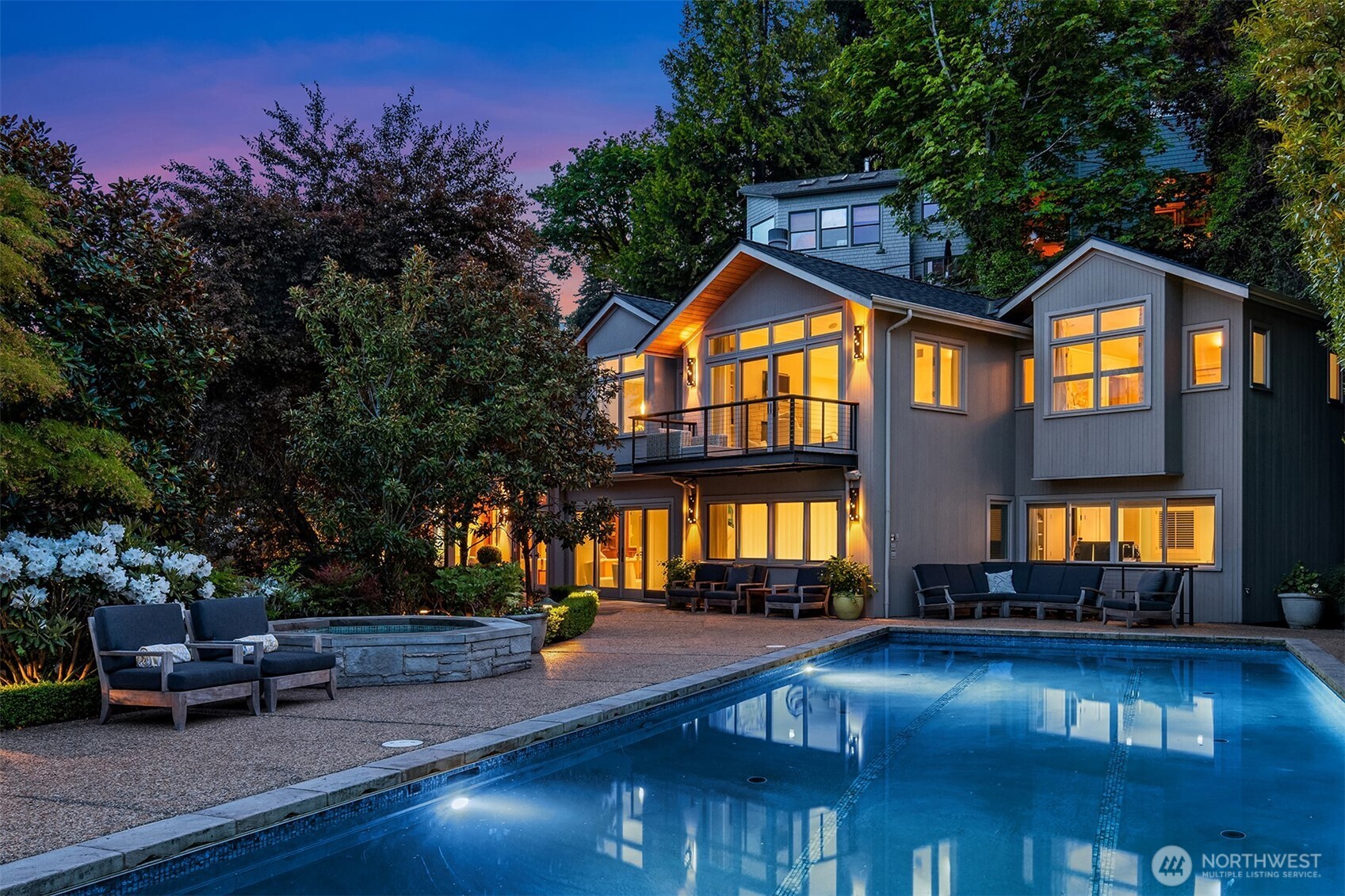 Undisclosed Address Seattle, WA 98112 - Photo 4 of 10 a front view of a house with swimming pool