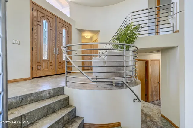 a view of entryway with wooden floor