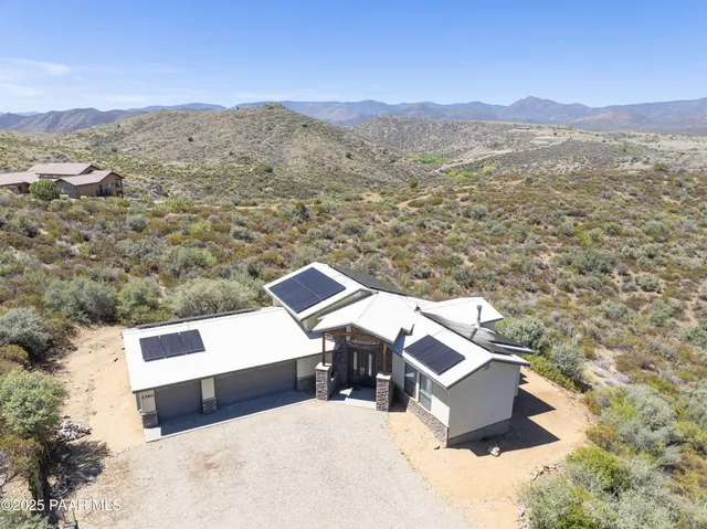 a view of a mountain with a outdoor space