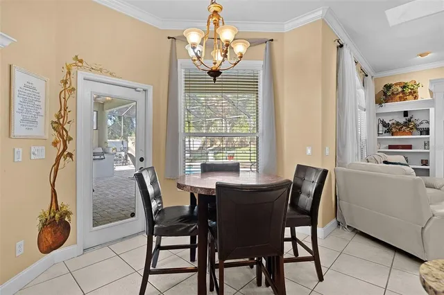 a bathroom with a granite countertop double vanity sink and a mirror