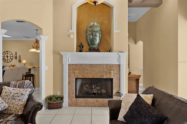 a dining room with furniture and chandelier