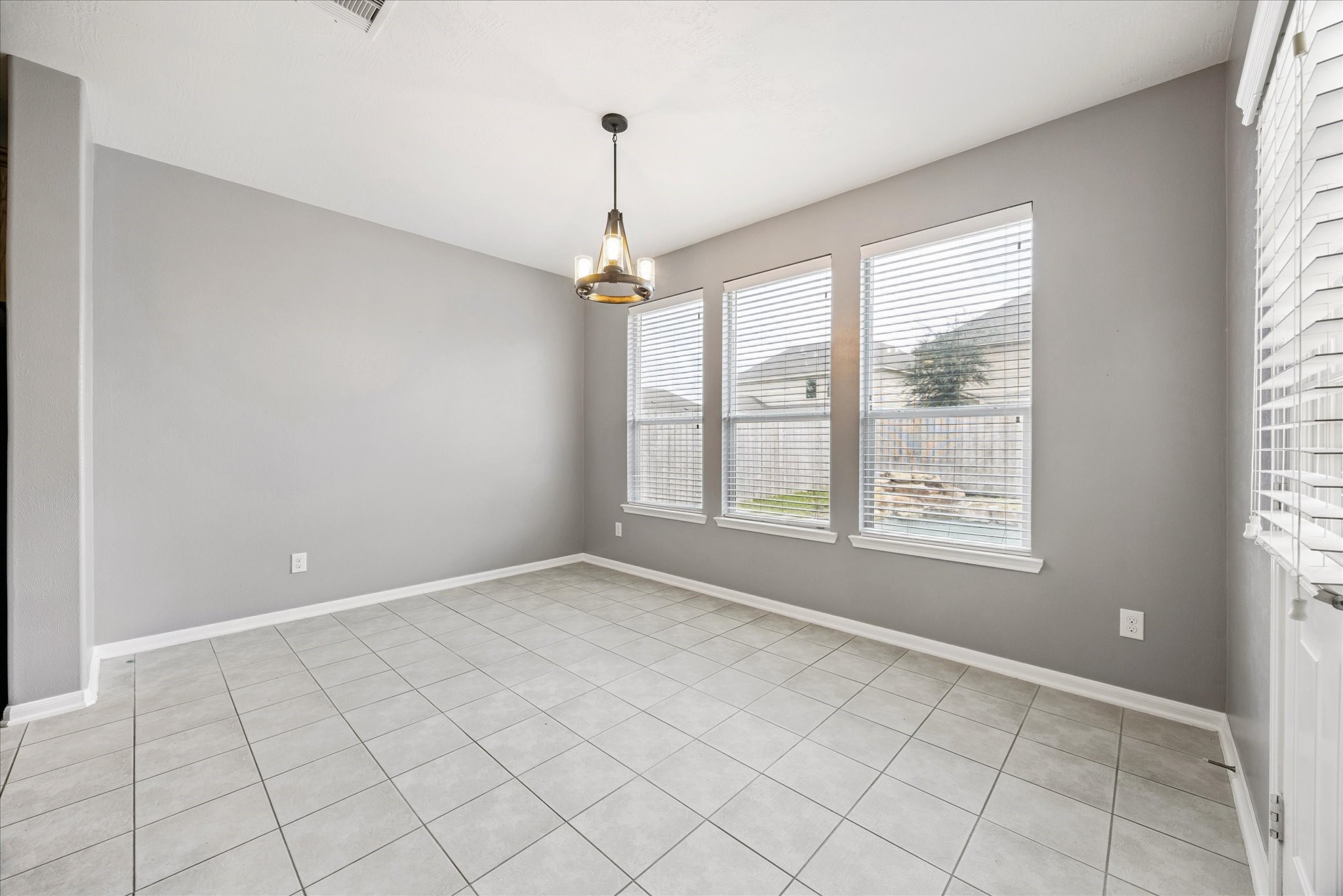 8506 Sweetstone Field Court Cypress, TX 77433 - Photo 12 of 33 a view of an empty room with a window