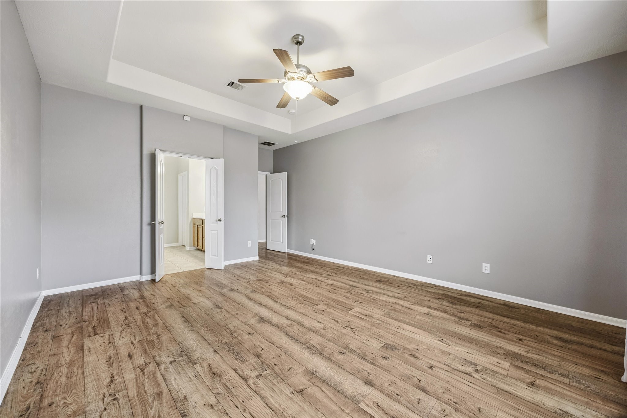 8506 Sweetstone Field Court Cypress, TX 77433 - Photo 15 of 33 a view of a livingroom with a ceiling fan