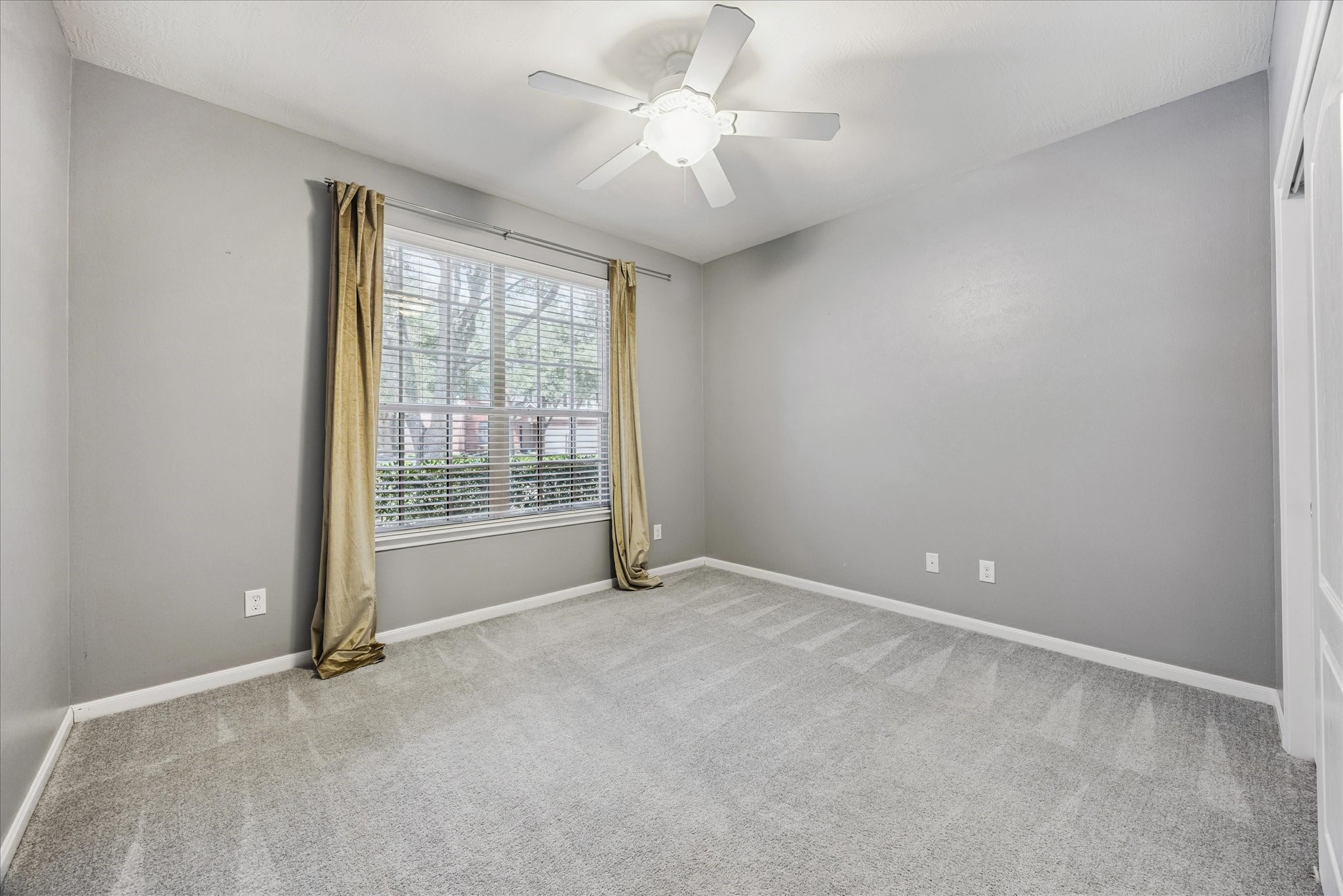 8506 Sweetstone Field Court Cypress, TX 77433 - Photo 20 of 33 a view of an empty room with a window