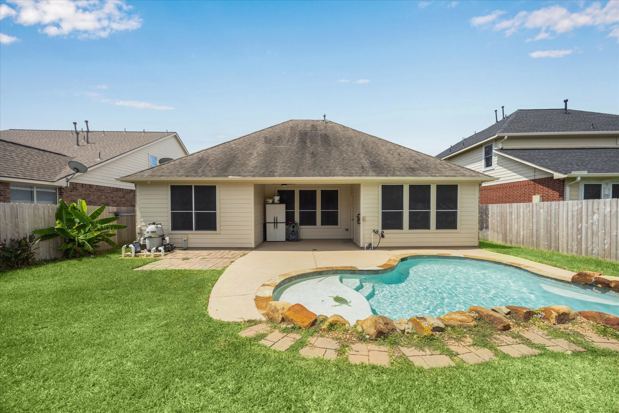 8506 Sweetstone Field Court Cypress, TX 77433 - Photo 26 of 33 a front view of a house with a yard
