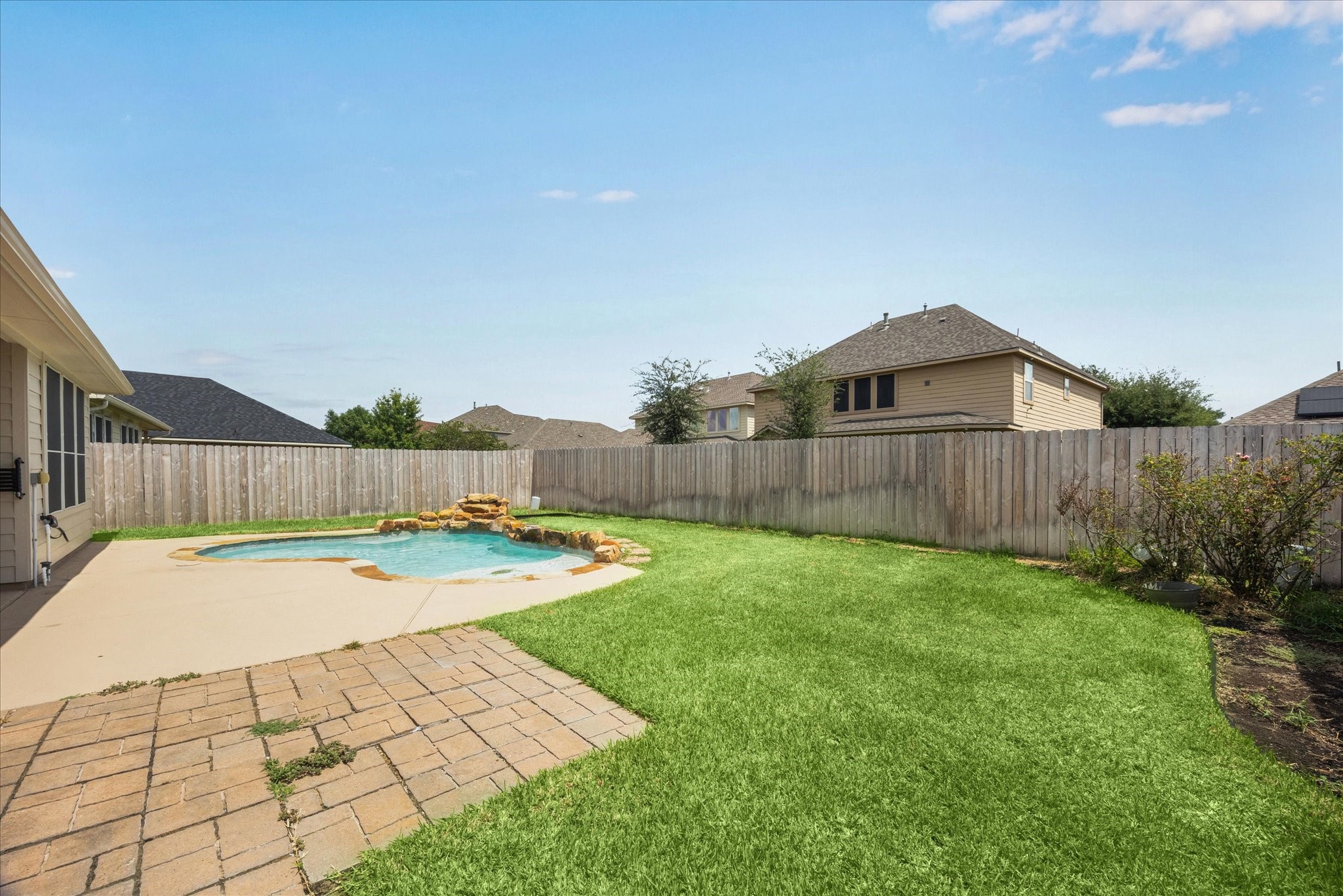8506 Sweetstone Field Court Cypress, TX 77433 - Photo 29 of 33 a view of a backyard with wooden floor