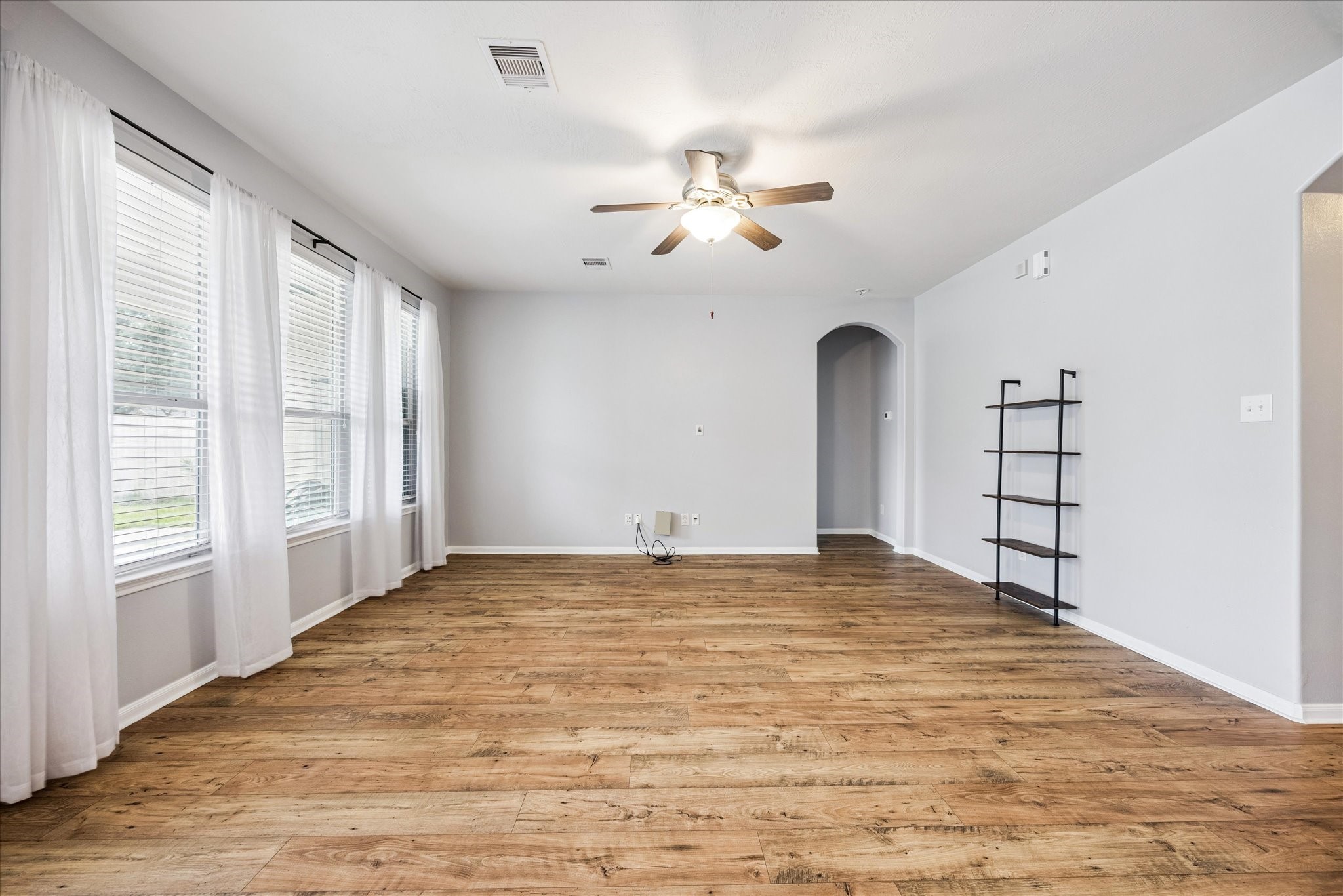 8506 Sweetstone Field Court Cypress, TX 77433 - Photo 6 of 33 a view of an empty room with a window