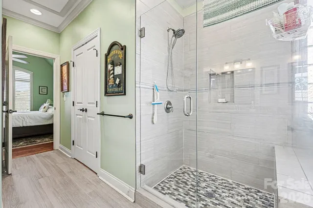 a view of a house with a yard patio and fire pit