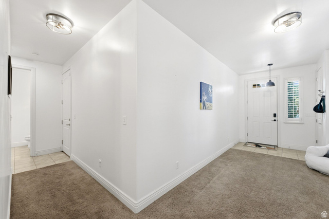7772 South Rustic Cove Midvale, UT 84047 - Photo 39 of 39 Bright, open floor plan with soaring vaulted ceilings and abundant natural light from recessed fixtures