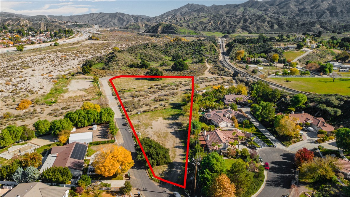 0 Lost Canyon Road Canyon Country, CA 91387 - Photo 4 of 10 an aerial view of residential houses with outdoor space