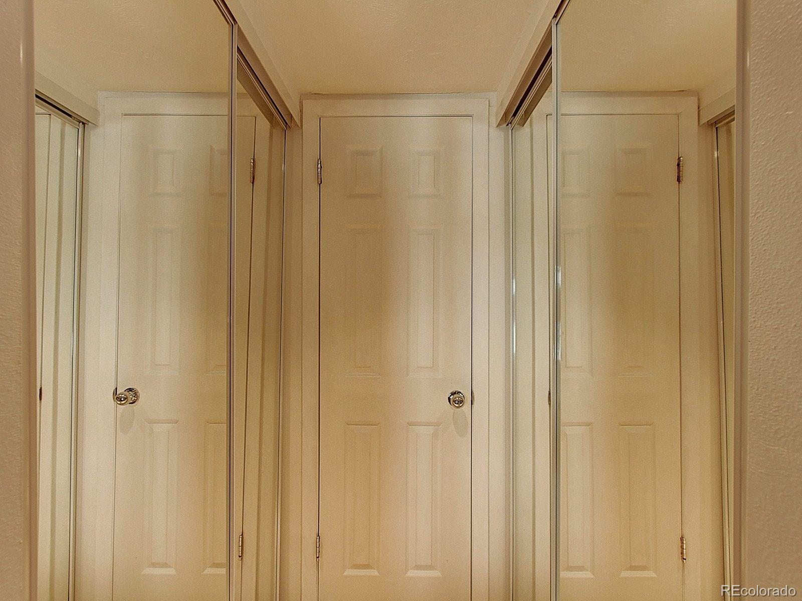 6410 South Dayton Street, Unit I08 Englewood, CO 80111 - Photo 19 of 32 a bathroom with a shower and a shower curtain