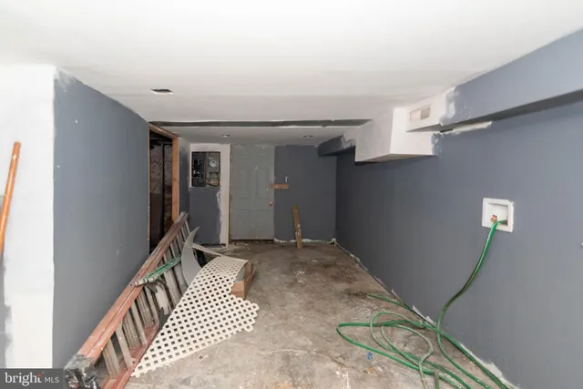 a view of a hallway with a bedroom