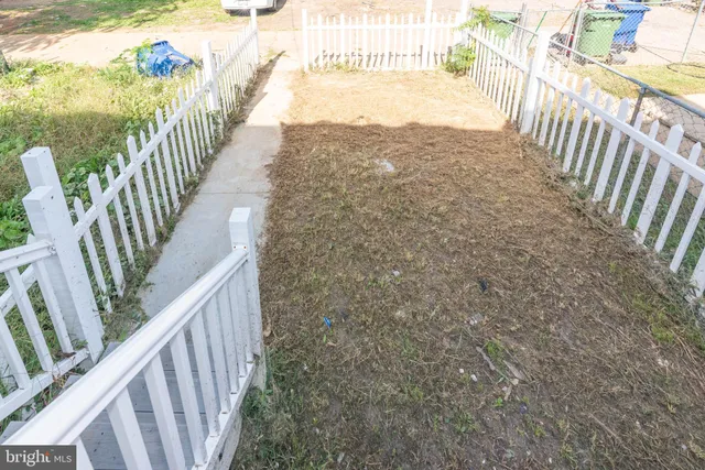 a view of balcony with wooden floor