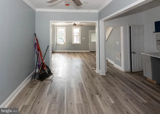 a view of entryway with wooden floor