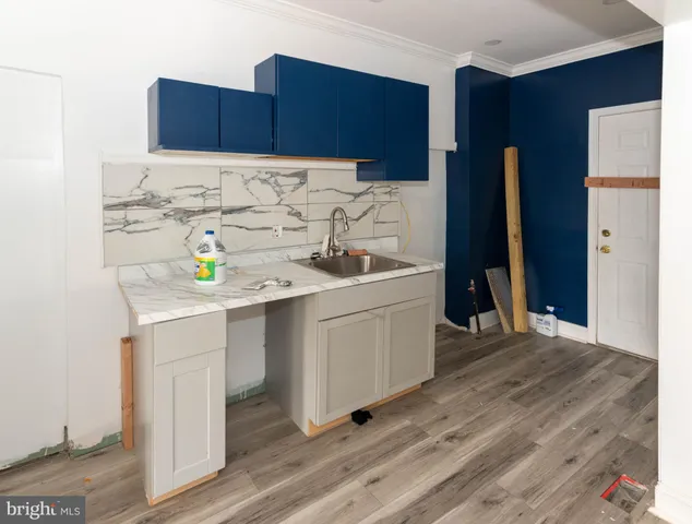 a utility room with cabinets