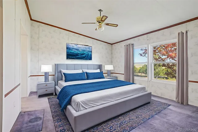 a view of a large garden with an outdoor space and seating area