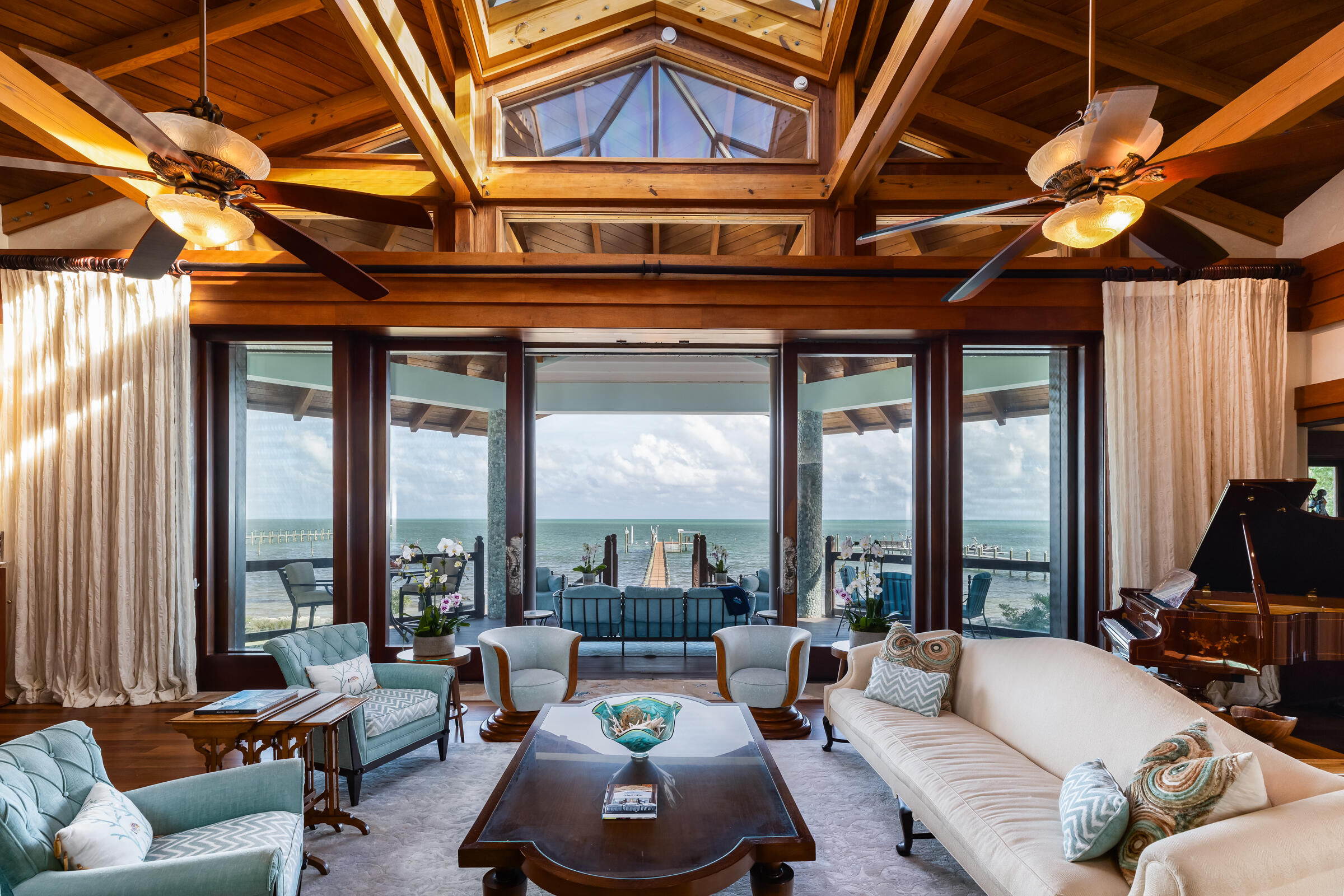 89301 Old State Road Tavernier, FL 33070 - Photo 2 of 99 a living room with furniture and a large window