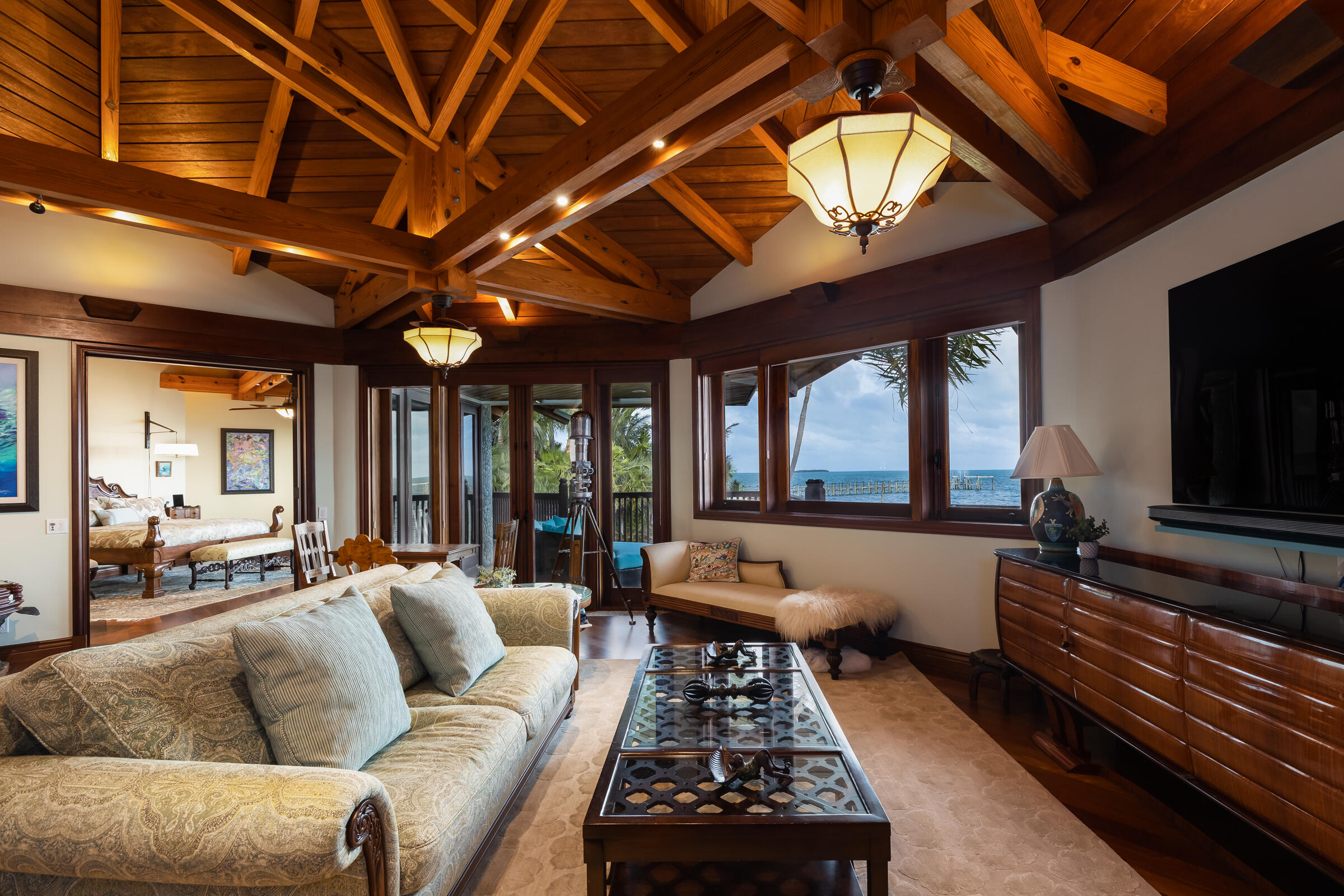89301 Old State Road Tavernier, FL 33070 - Photo 26 of 99 a living room with furniture fireplace and flat screen tv