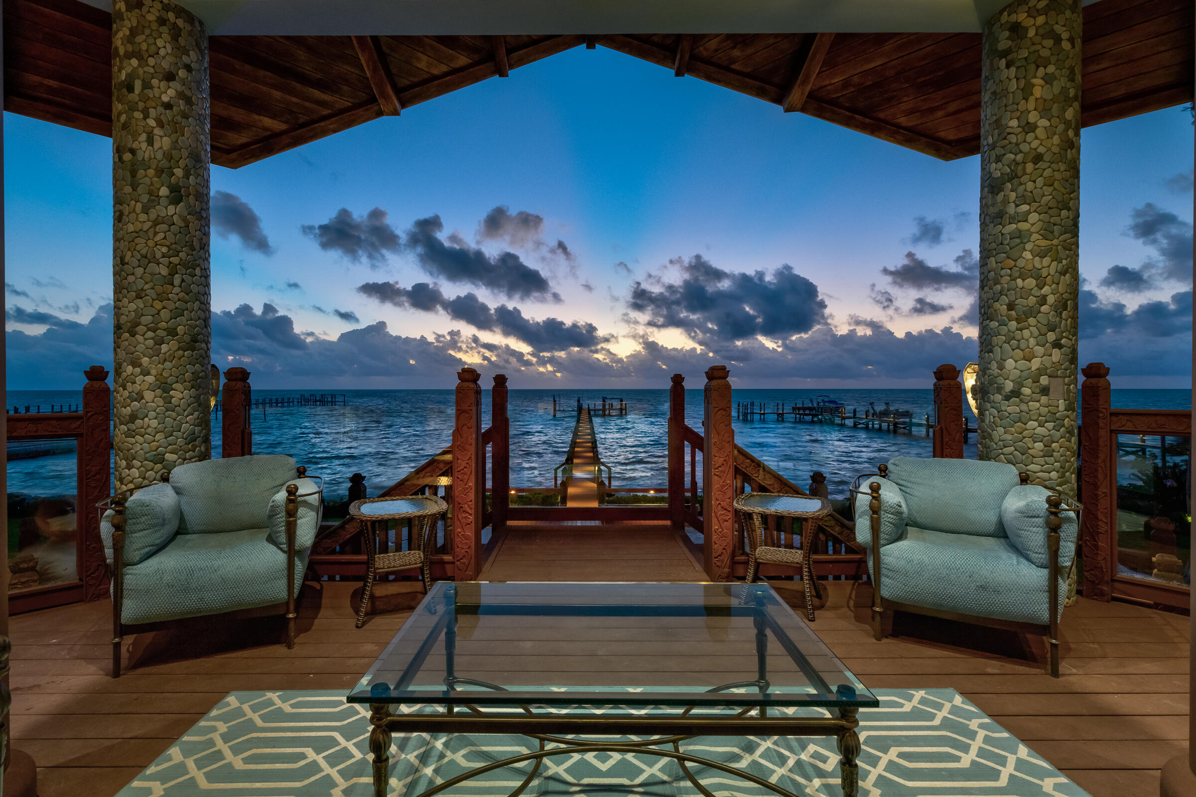 89301 Old State Road Tavernier, FL 33070 - Photo 41 of 99 a view of a patio with couches fire pit and a table