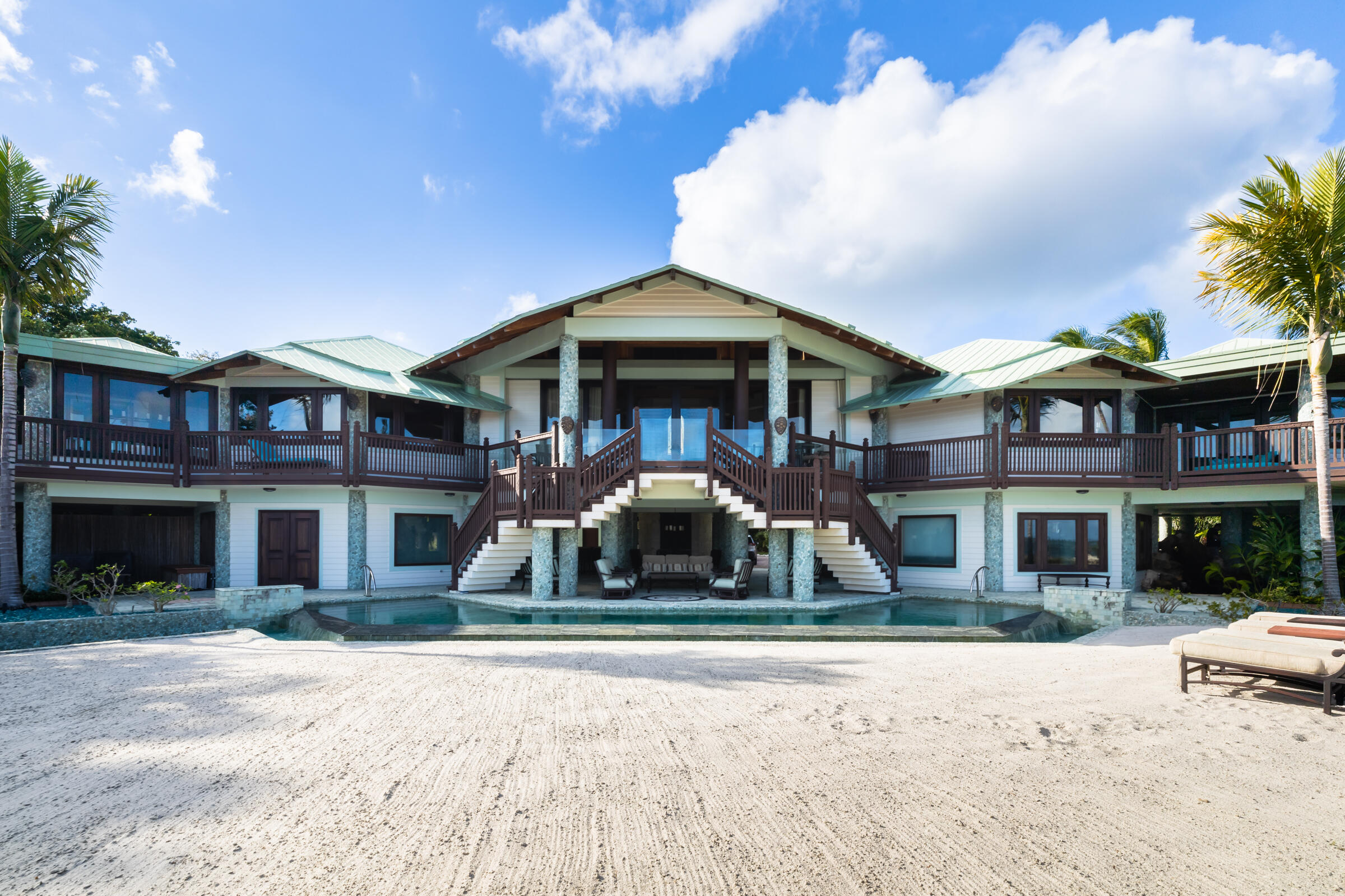 89301 Old State Road Tavernier, FL 33070 - Photo 46 of 99 a front view of a house with a yard