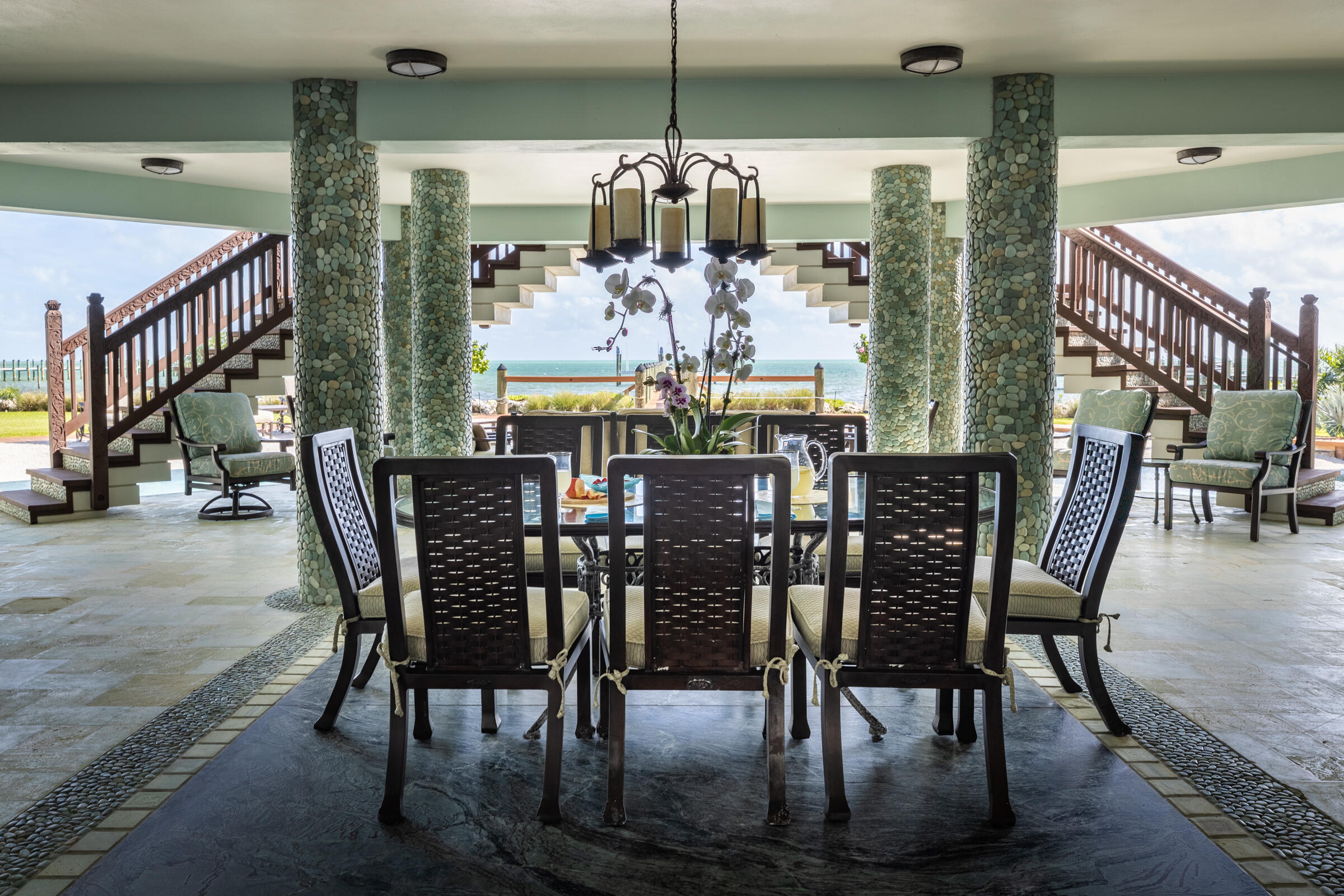 89301 Old State Road Tavernier, FL 33070 - Photo 54 of 99 a view of a dining room with furniture window and wooden floor