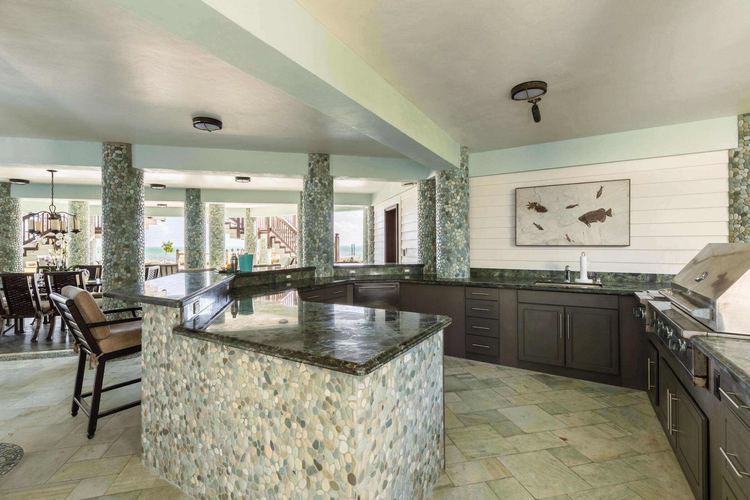 89301 Old State Road Tavernier, FL 33070 - Photo 55 of 99 a kitchen with stainless steel appliances granite countertop a sink a stove and a refrigerator