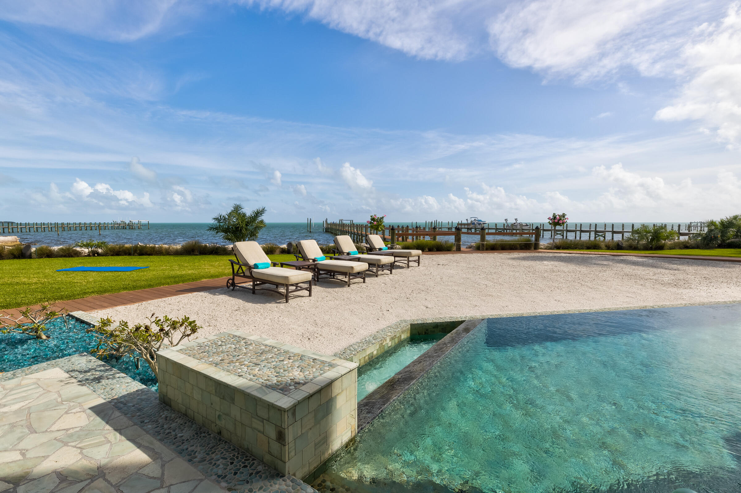 89301 Old State Road Tavernier, FL 33070 - Photo 65 of 99 a view of a lake with houses in the back