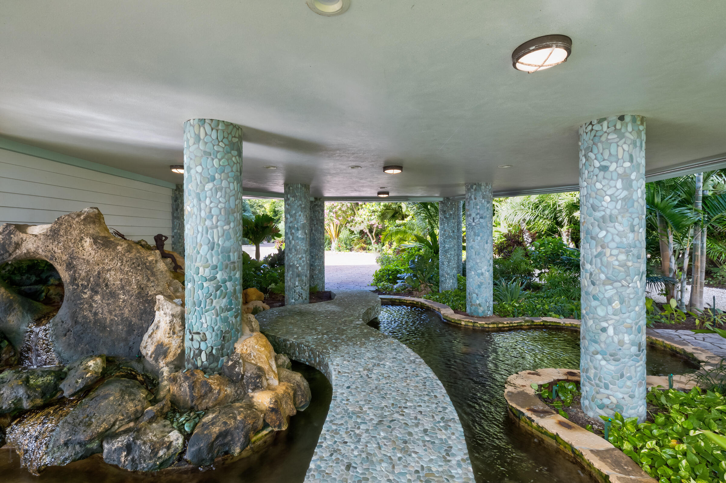 89301 Old State Road Tavernier, FL 33070 - Photo 66 of 99 a room with garden view and a potted plant