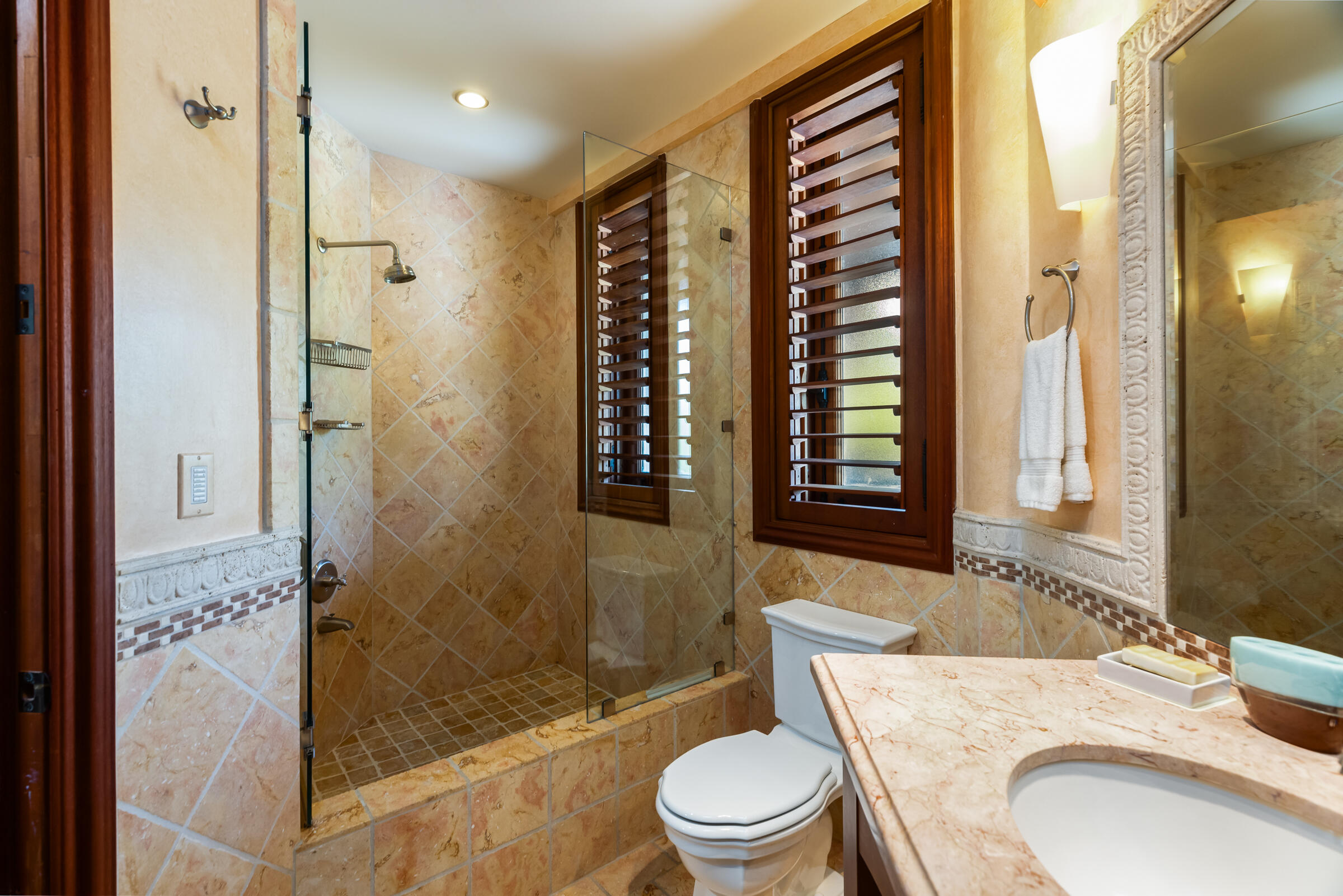 89301 Old State Road Tavernier, FL 33070 - Photo 75 of 99 a bathroom with a granite countertop sink toilet and shower