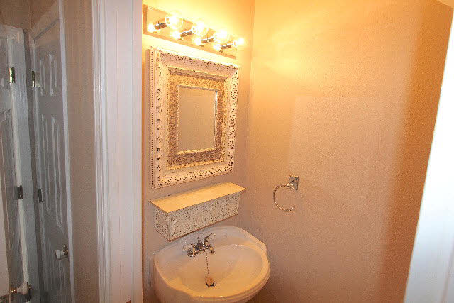 27154 Marina Road, Unit A Orange Beach, AL 36561 - Photo 16 of 23 Half Bathroom