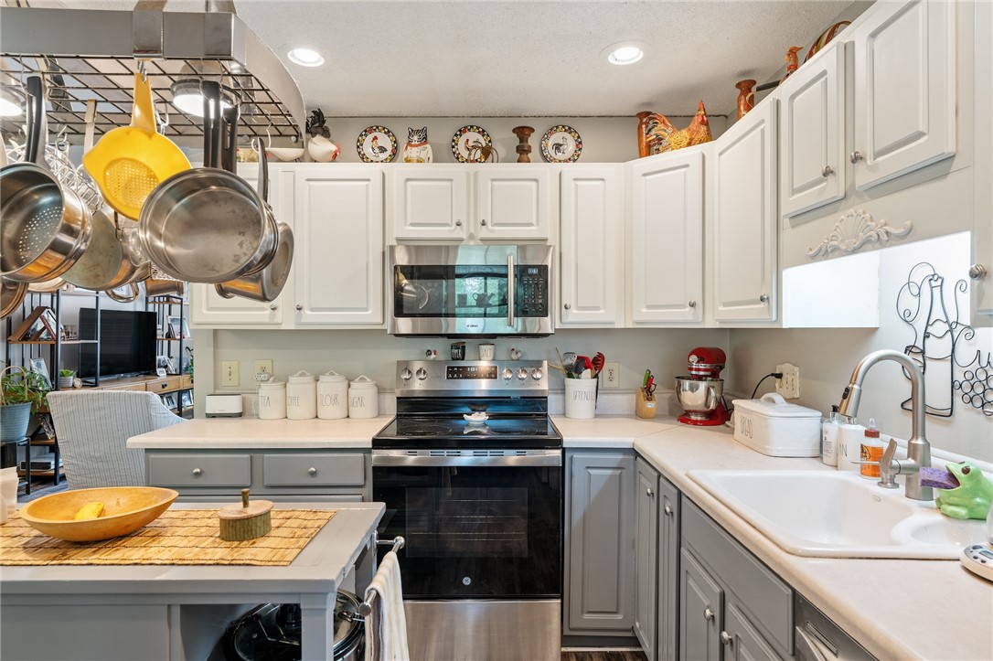 1412 Forest Lane Anderson, SC 29621 - Photo 29 of 31 This bright kitchen features ample cabinetry and modern stainless steel appliances.