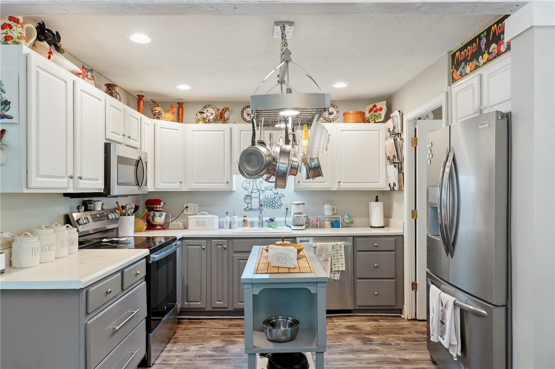 1412 Forest Lane Anderson, SC 29621 - Photo 30 of 31 This functional kitchen features ample cabinetry and modern appliances, perfect for daily living and entertaining.