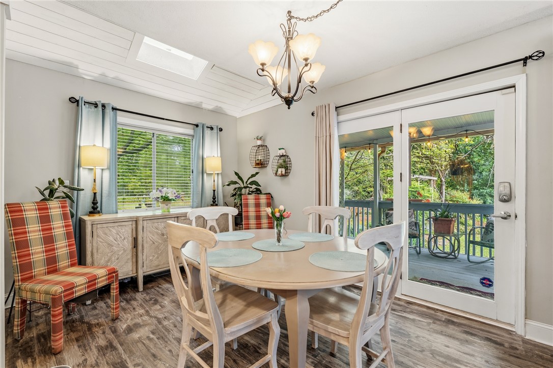 1412 Forest Lane Anderson, SC 29621 - Photo 31 of 31 This bright dining area offers direct access to an outdoor deck, perfect for alfresco dining.
