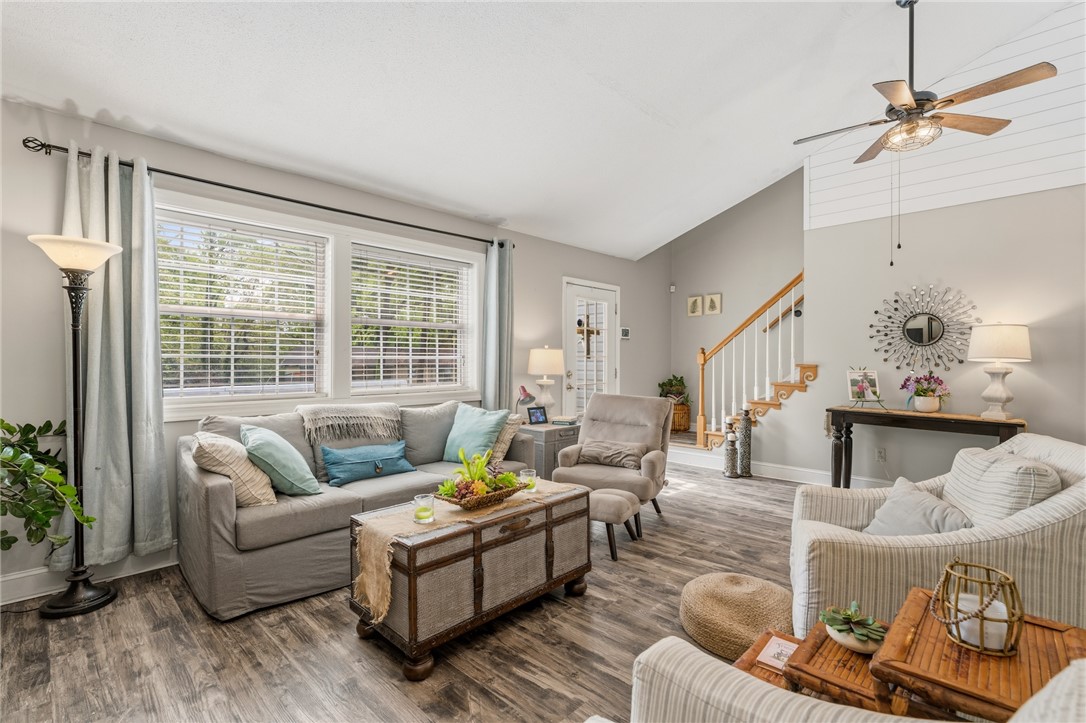1412 Forest Lane Anderson, SC 29621 - Photo 7 of 31 Bright and airy living room with vaulted ceilings, inviting natural light.