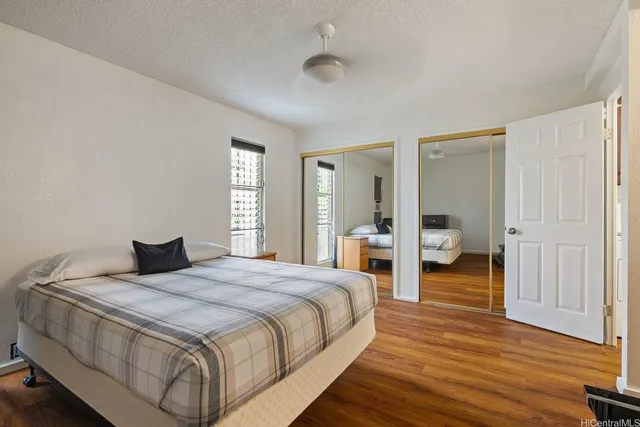 a bedroom with a bed and closet