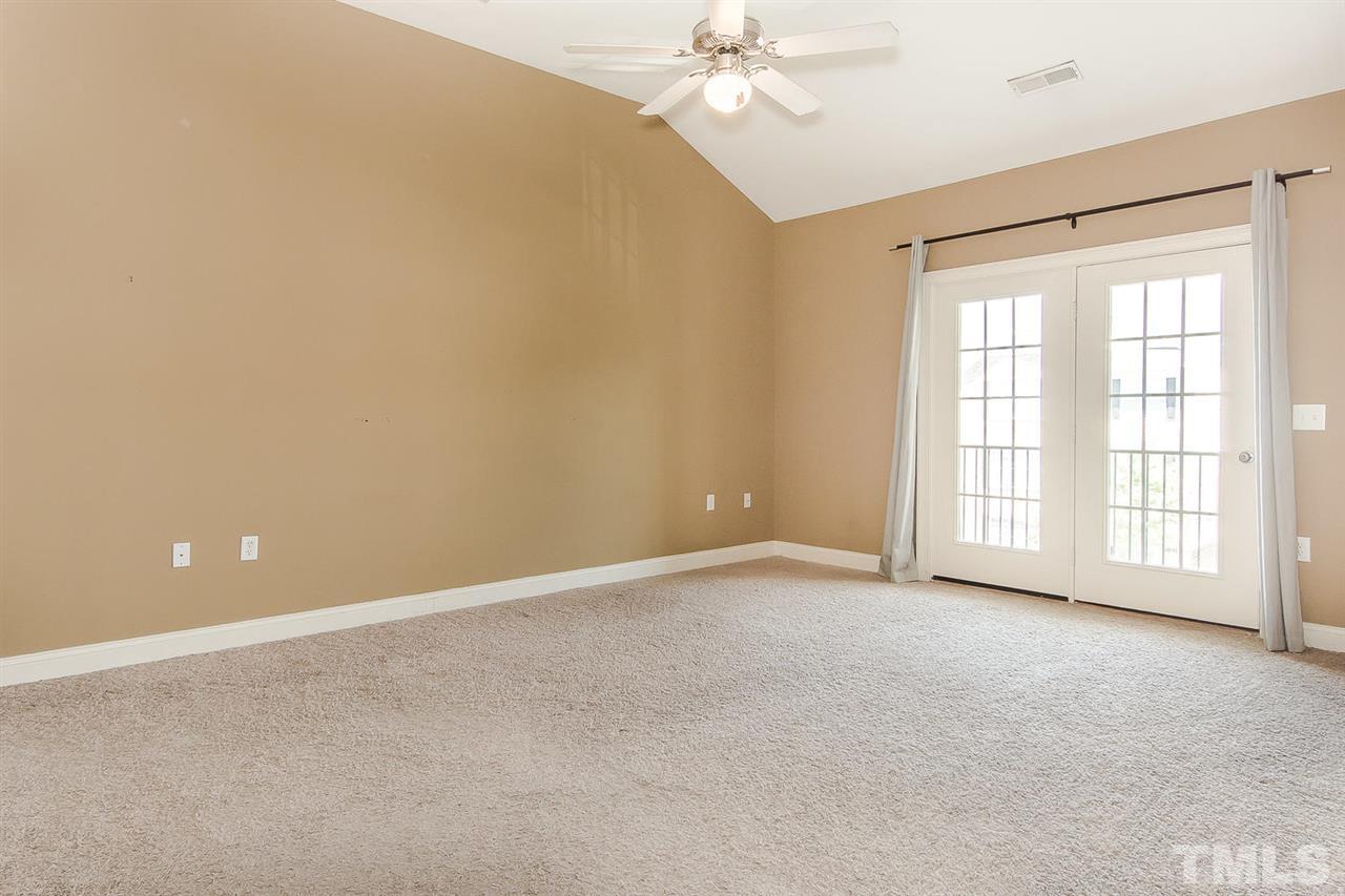 3811 Lunceston Way, Unit 301 Raleigh, NC 27613 - Photo 7 of 8 a view of an empty room with a window