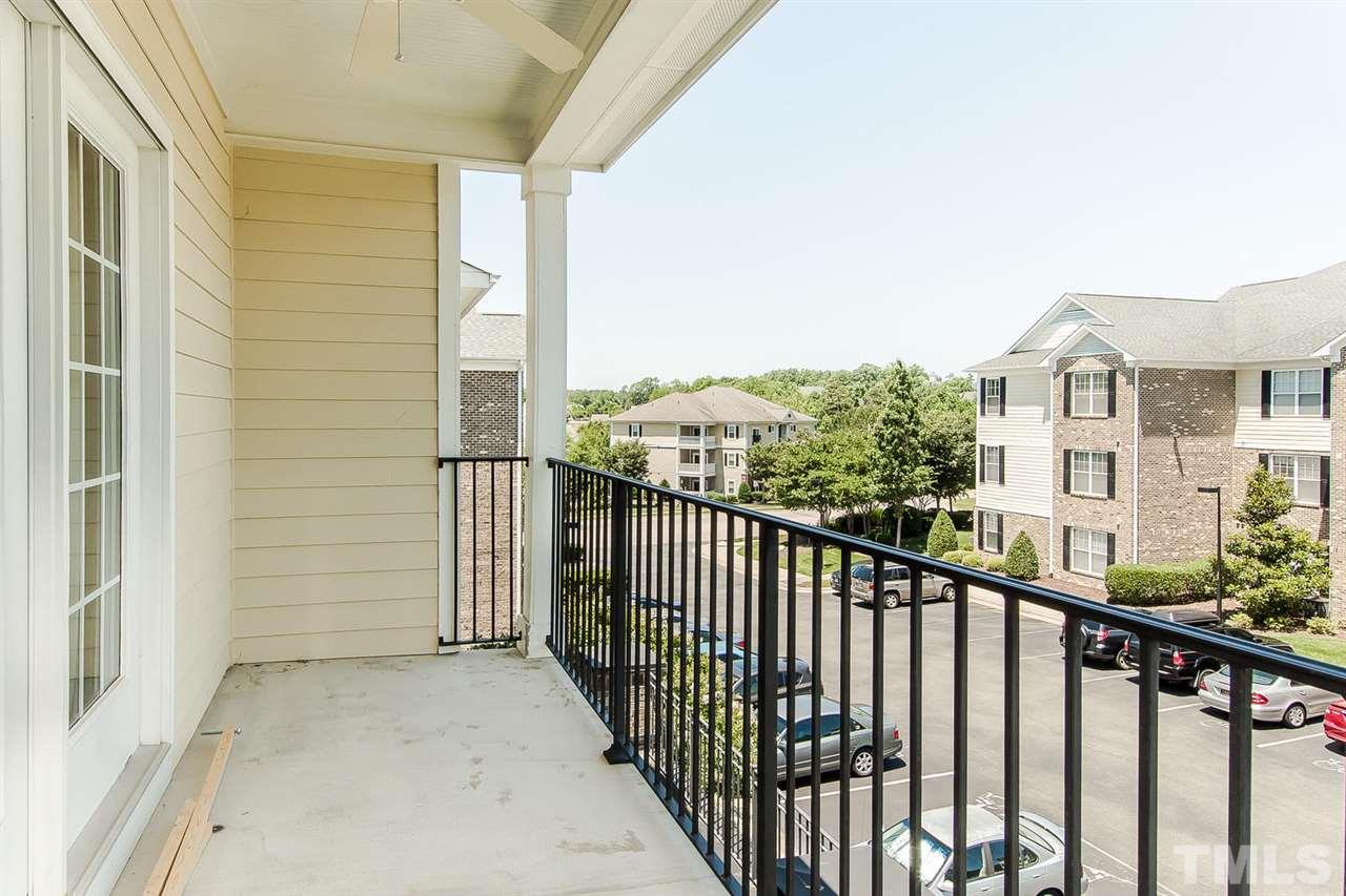 3811 Lunceston Way, Unit 301 Raleigh, NC 27613 - Photo 8 of 8 a view of a balcony with an outdoor space