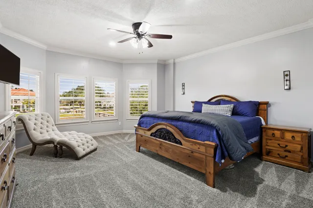 a view of a chairs and tables in a patio