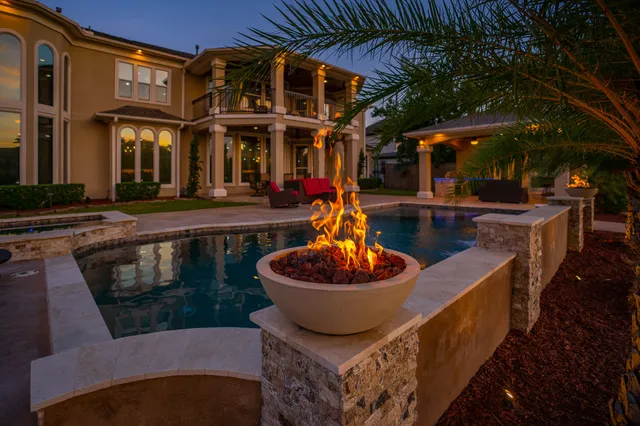 a view of a house with a big yard