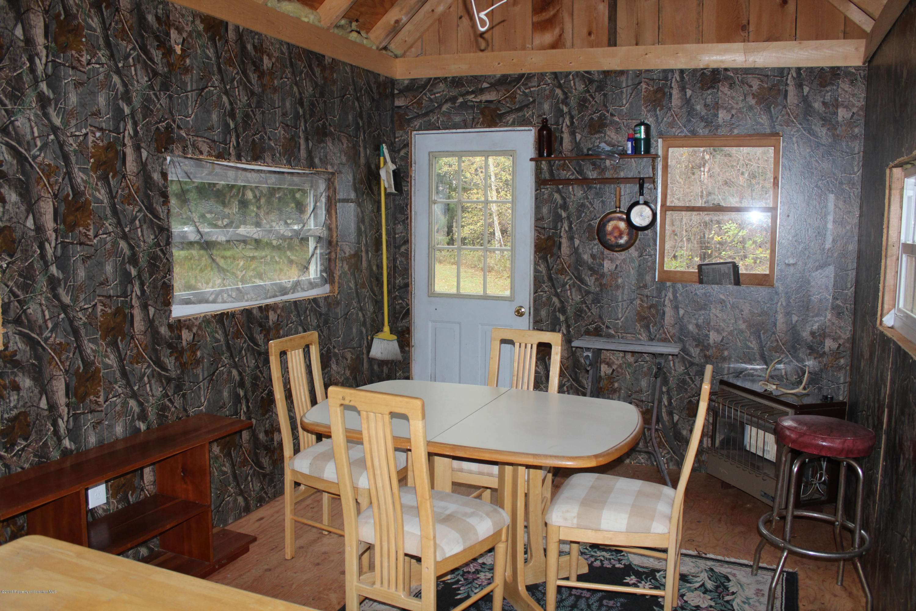 515 State Rte 2023 Forest City, PA 18421 - Photo 35 of 40 a view of a dining room with furniture and window