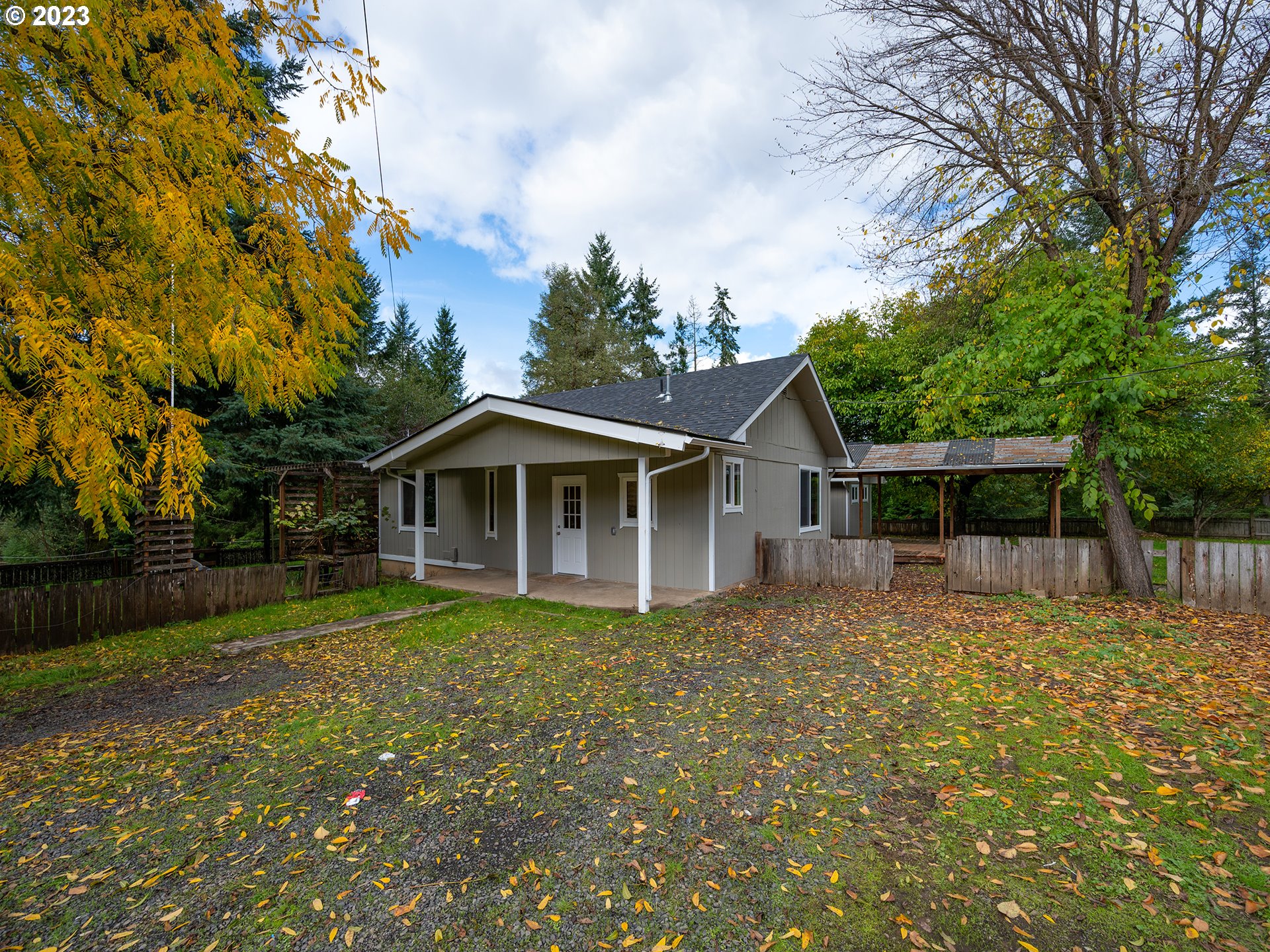 1590 Romie Howard Road Yoncalla, OR 97499 - Photo 1 of 48 a front view of a house with a yard